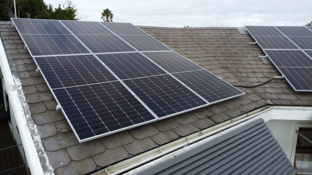 Solar panels installed on a residential roof in South Africa – promoting energy efficiency and sustainable home living.